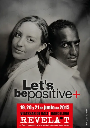 Black-and-white poster of a smiling woman and a man back-to-back, overlaid with 'Let's be positive+' and a red banner for June 19–21, 2015 in Vilassar de Dalt, Barcelona.