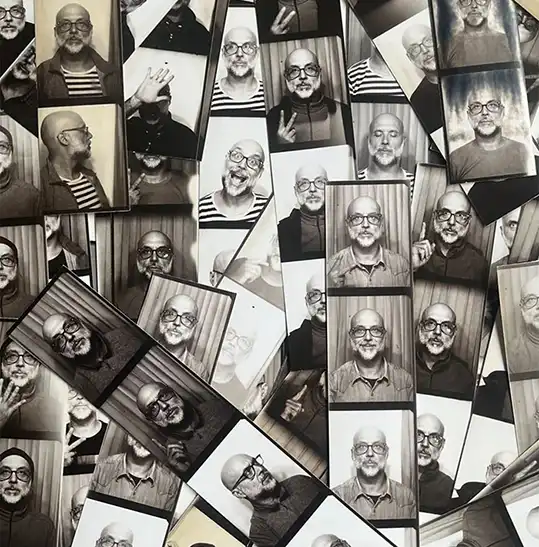 Miquel-Navarro - Revela't 2026 Collage of black-and-white portraits of a bald man with glasses in various poses, arranged as overlapping photo cards.
